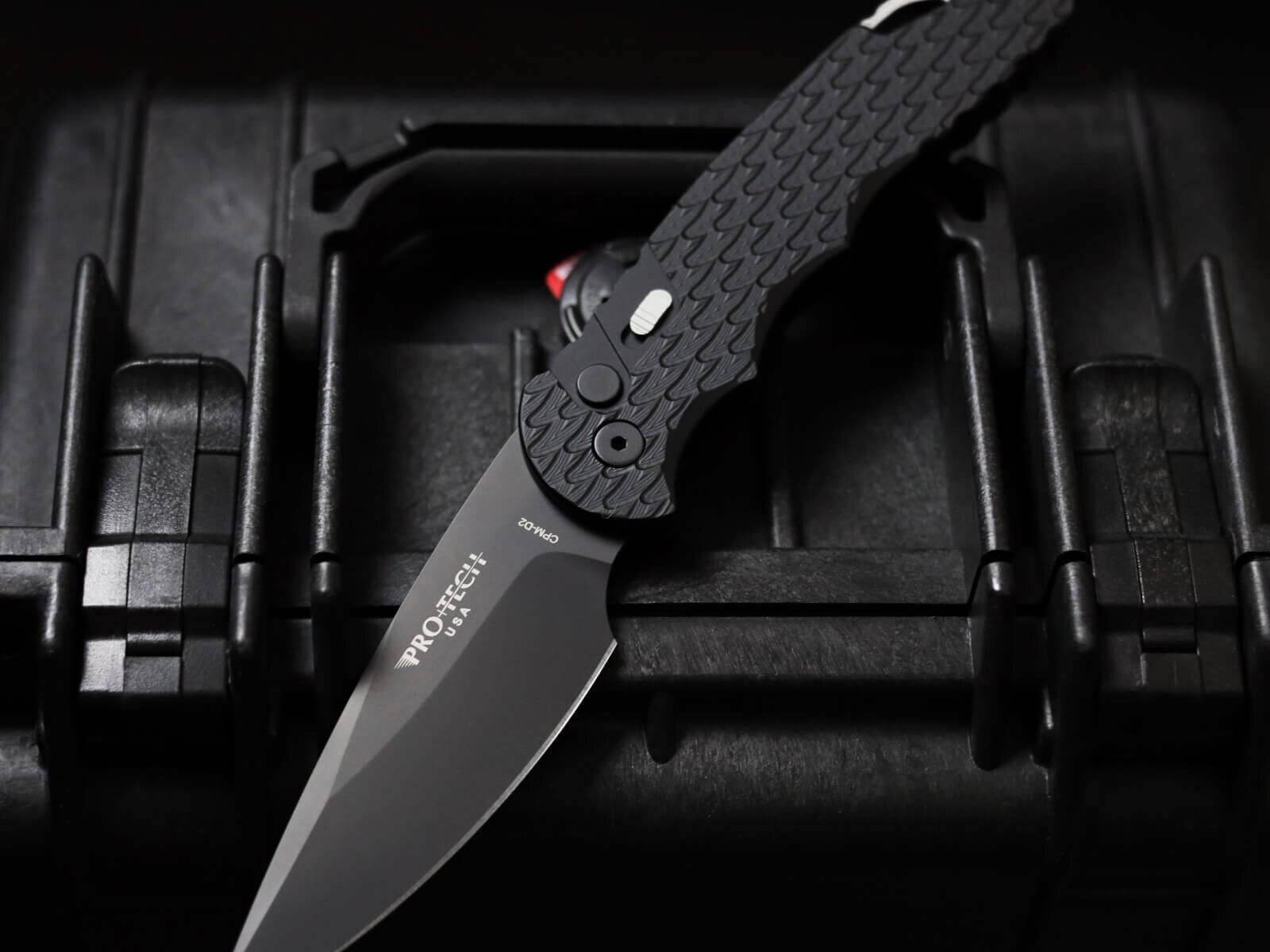 black knife on black box